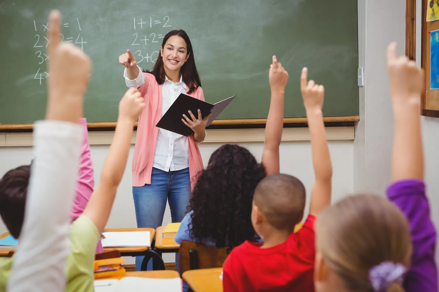 Teacher leading an engaged classroom discussion